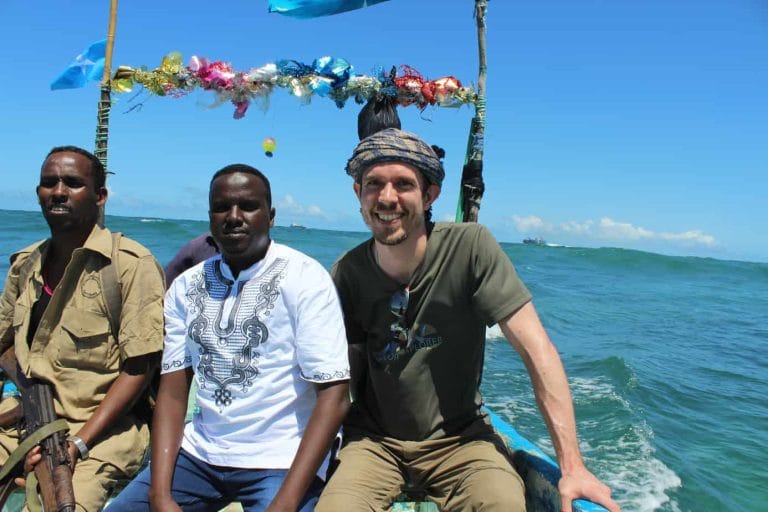 Untamed Borders guest on a boat in Mogadishu, Somalia